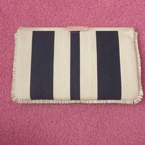 Navy/tan straw, striped clutch with gold details